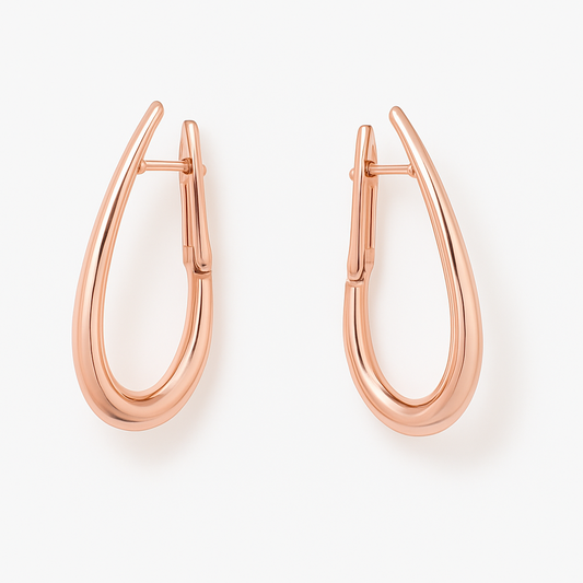 Rose gold hoop earrings on a white background